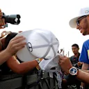 Lewis Hamilton (GBR) Mercedes AMG F1 signs autographs for the fans at Formula One World Championship, Rd19, Abu Dhabi Grand Prix, Preparations, Yas Marina Circuit, Abu Dhabi, UAE, Thursday 26 November 2015. © Sutton Motorsport Images