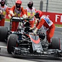 The car of Fernando Alonso (ESP) McLaren MP4-30 is recovered after stopping on track in FP3 at Formula One World Championship, Rd8, Austrian Grand Prix, Qualifying, Spielberg, Austria, Saturday 20 June 2015. © Sutton Motorsport Images