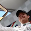 Race winner Nico Rosberg (GER) Mercedes AMG F1 celebrates with the trophy on the podium at Formula One World Championship, Rd8, Austrian Grand Prix, Race, Spielberg, Austria, Sunday 21 June 2015. © Sutton Motorsport Images