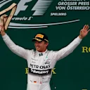 (L to R): Lewis Hamilton (GBR) Mercedes AMG F1, race winner Nico Rosberg (GER) Mercedes AMG F1 and Felipe Massa (BRA) Williams celebrate on the podium with their trophies at Formula One World Championship, Rd8, Austrian Grand Prix, Race, Spielberg, Austria, Sunday 21 June 2015. © Sutton Motorsport Images