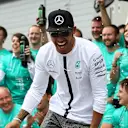 Second placed Lewis Hamilton (GBR) Mercedes AMG F1 celebrates with the team at Formula One World Championship, Rd8, Austrian Grand Prix, Race, Spielberg, Austria, Sunday 21 June 2015. © Sutton Motorsport Images