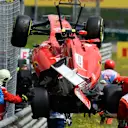 The crashed car of Kimi Raikkonen (FIN) Ferrari SF15-T is recovered  at Formula One World Championship, Rd8, Austrian Grand Prix, Race, Spielberg, Austria, Sunday 21 June 2015. © Sutton Motorsport Images