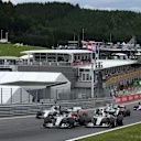 Nico Rosberg (GER) Mercedes AMG F1 W06 and Lewis Hamilton (GBR) Mercedes AMG F1 W06 at the start of the race at Formula One World Championship, Rd8, Austrian Grand Prix, Race, Spielberg, Austria, Sunday 21 June 2015. © Sutton Motorsport Images