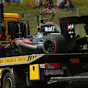 The car of race retiree Fernando Alonso (ESP) McLaren MP4-30 is recovered at Formula One World Championship, Rd8, Austrian Grand Prix, Race, Spielberg, Austria, Sunday 21 June 2015. © Sutton Motorsport Images