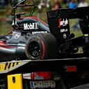 The car of race retiree Fernando Alonso (ESP) McLaren MP4-30 is recovered at Formula One World Championship, Rd8, Austrian Grand Prix, Race, Spielberg, Austria, Sunday 21 June 2015. © Sutton Motorsport Images