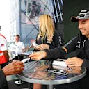 Sergio Perez (MEX) Force India signs autographs for the fans at Formula One World Championship, Rd8, Austrian Grand Prix, Preparations, Spielberg, Austria, Thursday 18 June 2015. © Sutton Motorsport Images