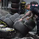 Red Bull Racing mechanic washes Pirelli tyres and wheels at Formula One Testing, Day One, Spielberg, Austria, Tuesday 23 June 2015. © Sutton Motorsport Images