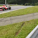 Esteban Gutierrez (MEX) Ferrari Test and Reserve Driver drives past the incident area with tyre marks in the grass from last weeks Austrian Grand Prix race at Formula One Testing, Day Two, Spielberg, Austria, Wednesday 24 June 2015. © Sutton Motorsport Images