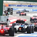 Cars leave the pitlane for the start of FP1 practise at Formula One World Championship, Rd4, Bahrain Grand Prix Practice, Bahrain International Circuit, Sakhir, Bahrain, Friday 17 April 2015. © Sutton Motorsport Images
