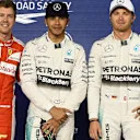 (L to R): Sebastian Vettel (GER) Ferrari, pole sitter Lewis Hamilton (GBR) Mercedes AMG F1 and Nico Rosberg (GER) Mercedes AMG F1 in parc ferme at Formula One World Championship, Rd4, Bahrain Grand Prix Qualifying, Bahrain International Circuit, Sakhir, Bahrain, Saturday 18  April 2015. © Sutton Motorsport Images