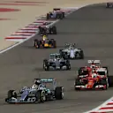 Lewis Hamilton (GBR) Mercedes AMG F1 W06 leads Sebastian Vettel (GER) Ferrari SF15-T and Kimi Raikkonen (FIN) Ferrari SF15-T at the start of the race Formula One World Championship, Rd4, Bahrain Grand Prix Race, Bahrain International Circuit, Sakhir, Bahrain, Sunday 19  April 2015. © Sutton Motorsport Images