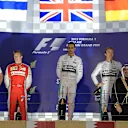 (L to R): Kimi Raikkonen (FIN) Ferrari, race winner Lewis Hamilton (GBR) Mercedes AMG F1 and Nico Rosberg (GER) Mercedes AMG F1 celebrate on the podium at Formula One World Championship, Rd4, Bahrain Grand Prix Race, Bahrain International Circuit, Sakhir, Bahrain, Sunday 19  April 2015. © Sutton Motorsport Images