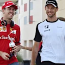 Sebastian Vettel (GER) Ferrari and Jenson Button (GBR) McLaren at Formula One World Championship, Rd4, Bahrain Grand Prix Race, Bahrain International Circuit, Sakhir, Bahrain, Sunday 19  April 2015. © Sutton Motorsport Images