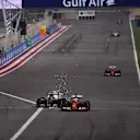 Nico Rosberg (GER) Mercedes AMG F1 W06 and Sebastian Vettel (GER) Ferrari SF15-T battle at Formula One World Championship, Rd4, Bahrain Grand Prix Race, Bahrain International Circuit, Sakhir, Bahrain, Sunday 19  April 2015. © Sutton Motorsport Images