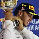 Race winner Lewis Hamilton (GBR) Mercedes AMG F1 celebrates on the podium with the trophy at Formula One World Championship, Rd4, Bahrain Grand Prix Race, Bahrain International Circuit, Sakhir, Bahrain, Sunday 19  April 2015. © Sutton Motorsport Images