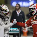Lewis Hamilton (GBR) Mercedes AMG F1 and Kimi Raikkonen (FIN) Ferrari SF15-T celebrate in parc ferme at Formula One World Championship, Rd4, Bahrain Grand Prix Race, Bahrain International Circuit, Sakhir, Bahrain, Sunday 19  April 2015. © Sutton Motorsport Images