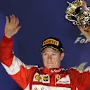 Kimi Raikkonen (FIN) Ferrari celebrates with his trophy on the podium at Formula One World Championship, Rd4, Bahrain Grand Prix Race, Bahrain International Circuit, Sakhir, Bahrain, Sunday 19  April 2015. © Sutton Motorsport Images