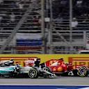 Nico Rosberg (GER) Mercedes AMG F1 W06 and Kimi Raikkonen (FIN) Ferrari SF15-T battle at Formula One World Championship, Rd4, Bahrain Grand Prix Race, Bahrain International Circuit, Sakhir, Bahrain, Sunday 19  April 2015. © Sutton Motorsport Images
