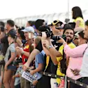 Fans on the pitlane walk at Formula One World Championship, Rd4, Bahrain Grand Prix Preparations, Bahrain International Circuit, Sakhir, Bahrain, Thursday 16  April 2015. © Sutton Motorsport Images