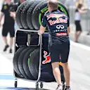 Red Bull Racing mechanic with Pirelli tyres at Formula One World Championship, Rd4, Bahrain Grand Prix Preparations, Bahrain International Circuit, Sakhir, Bahrain, Thursday 16  April 2015. © Sutton Motorsport Images