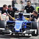 Sauber mechanics with Sauber C34 in pit lane at Formula One World Championship, Rd4, Bahrain Grand Prix Preparations, Bahrain International Circuit, Sakhir, Bahrain, Thursday 16  April 2015. © Sutton Motorsport Images