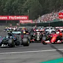 Nico Rosberg (GER) Mercedes AMG F1 W06 and Sebastian Vettel (GER) Ferrari SF15-T at the start of the race at Formula One World Championship, Rd11, Belgian Grand Prix, Race, Spa Francorchamps, Belgium, Sunday 23 August 2015. © Sutton Motorsport Images