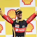 Third placed Romain Grosjean (FRA) Lotus F1 celebrates on the podium with the trophy at Formula One World Championship, Rd11, Belgian Grand Prix, Race, Spa Francorchamps, Belgium, Sunday 23 August 2015. © Sutton Motorsport Images