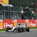 Race winner Lewis Hamilton (GBR) Mercedes AMG F1 W06 crosses the line and takes the chequered flag at Formula One World Championship, Rd11, Belgian Grand Prix, Race, Spa Francorchamps, Belgium, Sunday 23 August 2015. © Sutton Motorsport Images