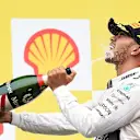 Race winner Lewis Hamilton (GBR) Mercedes AMG F1 celebrates on the podium with the champagne at Formula One World Championship, Rd11, Belgian Grand Prix, Race, Spa Francorchamps, Belgium, Sunday 23 August 2015. © Sutton Motorsport Images