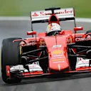 Sebastian Vettel (GER) Ferrari SF15-T lock up at Formula One World Championship, Rd18, Brazilian Grand Prix, Practice, Interlagos, Sao Paulo, Brazil, Friday 13 November 2015. © Sutton Motorsport Images