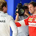 Pole sitter Nico Rosberg (GER) Mercedes AMG F1 and Sebastian Vettel (GER) Ferrari celebrate in parc ferme at Formula One World Championship, Rd18, Brazilian Grand Prix, Qualifying, Interlagos, Sao Paulo, Brazil, Saturday 14 November 2015. © Sutton Motorsport Images