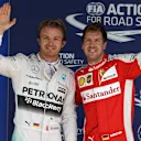 Pole sitter Nico Rosberg (GER) Mercedes AMG F1 and Sebastian Vettel (GER) Ferrari celebrate in parc ferme at Formula One World Championship, Rd18, Brazilian Grand Prix, Qualifying, Interlagos, Sao Paulo, Brazil, Saturday 14 November 2015. © Sutton Motorsport Images