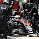 Jenson Button (GBR) McLaren MP4-30 pit stop at Formula One World Championship, Rd18, Brazilian Grand Prix, Race, Interlagos, Sao Paulo, Brazil, Sunday 15 November 2015. © Sutton Motorsport Images