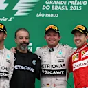 (L to R): Lewis Hamilton (GBR) Mercedes AMG F1, James Waddell (GBR) Mercedes AMG F1 Race Team Composite Techician, race winner Nico Rosberg (GER) Mercedes AMG F1 and Sebastian Vettel (GER) Ferrari celebrate on the podium at Formula One World Championship, Rd18, Brazilian Grand Prix, Race, Interlagos, Sao Paulo, Brazil, Sunday 15 November 2015. © Sutton Motorsport Images