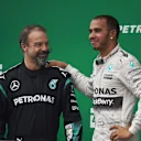 Lewis Hamilton (GBR) Mercedes AMG F1 and  James Waddell (GBR) Mercedes AMG F1 Race Team Composite Technician on the podium at Formula One World Championship, Rd18, Brazilian Grand Prix, Race, Interlagos, Sao Paulo, Brazil, Sunday 15 November 2015. © Sutton Motorsport Images