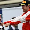 Sebastian Vettel (GER) Ferrari celebrates on the podium with the trophy at Formula One World Championship, Rd18, Brazilian Grand Prix, Race, Interlagos, Sao Paulo, Brazil, Sunday 15 November 2015. © Sutton Motorsport Images