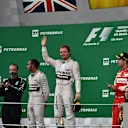 (L to R): Lewis Hamilton (GBR) Mercedes AMG F1, James Waddell (GBR) Mercedes AMG F1 Race Team Composite Technician, race winner Nico Rosberg (GER) Mercedes AMG F1 and Sebastian Vettel (GER) Ferrari celebrate on the podium at Formula One World Championship, Rd18, Brazilian Grand Prix, Race, Interlagos, Sao Paulo, Brazil, Sunday 15 November 2015. © Sutton Motorsport Images