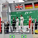 (L to R): Lewis Hamilton (GBR) Mercedes AMG F1, James Waddell (GBR) Mercedes AMG F1 Race Team Composite Technician, race winner Nico Rosberg (GER) Mercedes AMG F1 and Sebastian Vettel (GER) Ferrari celebrate on the podium at Formula One World Championship, Rd18, Brazilian Grand Prix, Race, Interlagos, Sao Paulo, Brazil, Sunday 15 November 2015. © Sutton Motorsport Images