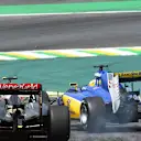 Pastor Maldonado (VEN) Lotus E23 Hybrid and Marcus Ericsson (SWE) Sauber C34 clash at Formula One World Championship, Rd18, Brazilian Grand Prix, Race, Interlagos, Sao Paulo, Brazil, Sunday 15 November 2015. © Sutton Motorsport Images