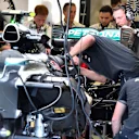 Mechanics work on the Mercedes AMG F1 W06 in the garage at Formula One World Championship, Rd9, British Grand Prix, Practice, Silverstone, England, Friday 3 July 2015. © Sutton Motorsport Images