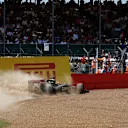 Romain Grosjean (FRA) Lotus E23 Hybrid spins into the gravel in FP2 at Formula One World Championship, Rd9, British Grand Prix, Practice, Silverstone, England, Friday 3 July 2015. © Sutton Motorsport Images