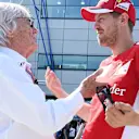 Bernie Ecclestone (GBR) CEO Formula One Group (FOM) talks with Sebastian Vettel (GER) Ferrari at Formula One World Championship, Rd9, British Grand Prix, Qualifying, Silverstone, England, Saturday 4 July 2015. © Sutton Motorsport Images
