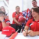 Will Stevens (GBR) Marussia and Roberto Merhi (ESP) Marussia sign autographs for the fans at Formula One World Championship, Rd9, British Grand Prix, Qualifying, Silverstone, England, Saturday 4 July 2015. © Sutton Motorsport Images