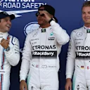 (L to R): Felipe Massa (BRA) Williams, pole sitter Lewis Hamilton (GBR) Mercedes AMG F1 and Nico Rosberg (GER) Mercedes AMG F1 celebrate in parc ferme at Formula One World Championship, Rd9, British Grand Prix, Qualifying, Silverstone, England, Saturday 4 July 2015. © Sutton Motorsport Images