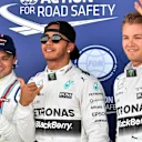 (L to R): Felipe Massa (BRA) Williams, pole sitter Lewis Hamilton (GBR) Mercedes AMG F1 and Nico Rosberg (GER) Mercedes AMG F1 celebrate in parc ferme at Formula One World Championship, Rd9, British Grand Prix, Qualifying, Silverstone, England, Saturday 4 July 2015. © Sutton Motorsport Images