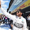 Pole sitter Lewis Hamilton (GBR) Mercedes AMG F1 celebrates in parc ferme at Formula One World Championship, Rd9, British Grand Prix, Qualifying, Silverstone, England, Saturday 4 July 2015. © Sutton Motorsport Images