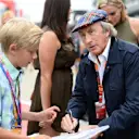 Jackie Stewart (GBR) signs autographs for the fans at Formula One World Championship, Rd9, British Grand Prix, Race, Silverstone, England, Sunday 5 July 2015. © Sutton Motorsport Images