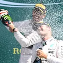 Race winner Lewis Hamilton (GBR) Mercedes AMG F1 and Nico Rosberg (GER) Mercedes AMG F1 celebrates on the podium with champagne at Formula One World Championship, Rd9, British Grand Prix, Race, Silverstone, England, Sunday 5 July 2015. © Sutton Motorsport Images