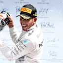 Race winner Lewis Hamilton (GBR) Mercedes AMG F1 celebrates on the podium with champagne at Formula One World Championship, Rd9, British Grand Prix, Race, Silverstone, England, Sunday 5 July 2015. © Sutton Motorsport Images