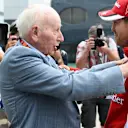 John Surtees (GBR) and Sebastian Vettel (GER) Ferrari at Formula One World Championship, Rd9, British Grand Prix, Race, Silverstone, England, Sunday 5 July 2015. © Sutton Motorsport Images